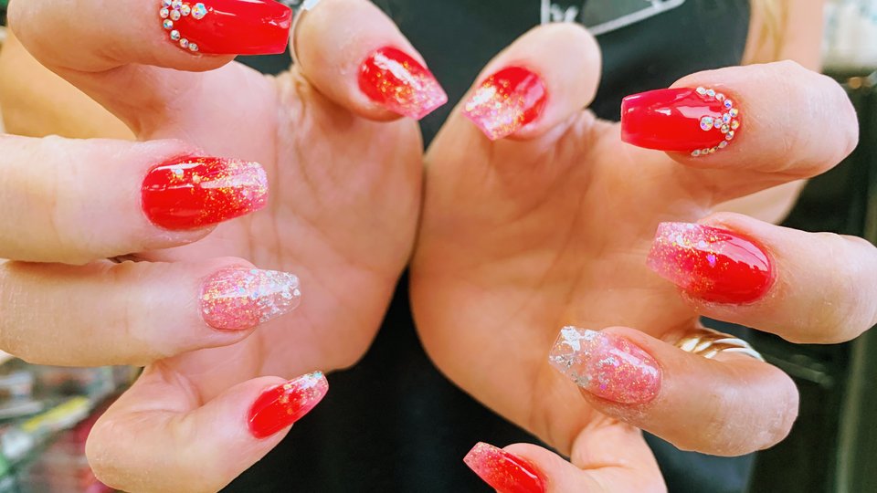 Manicured nails with a glossy finish.